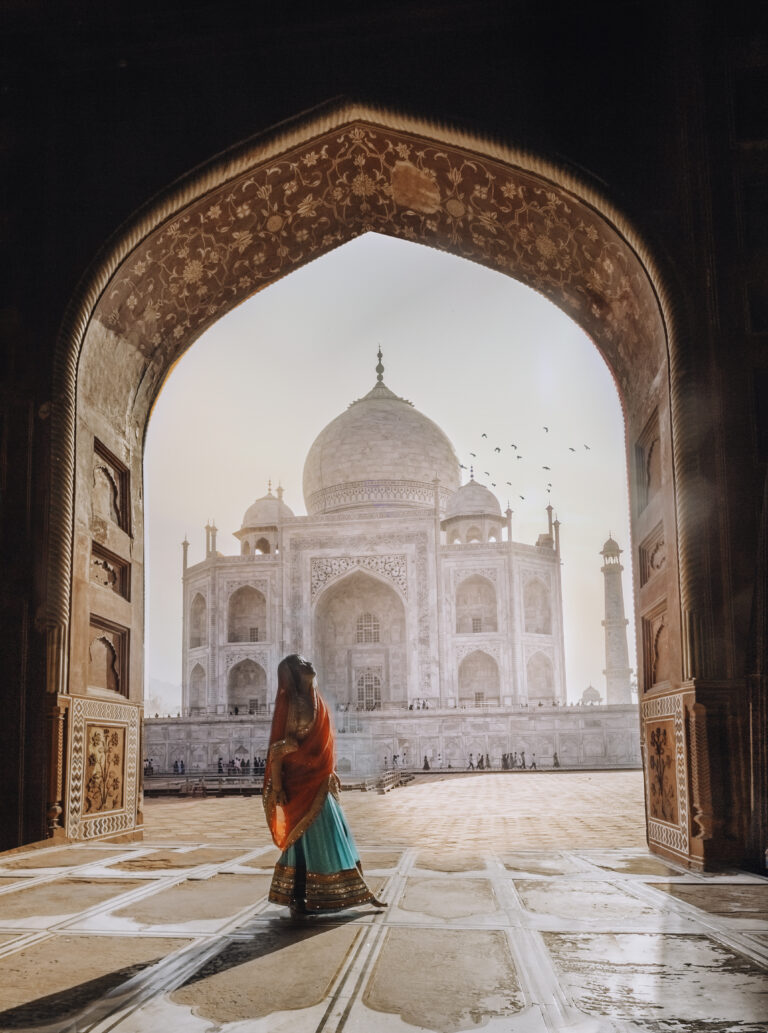 woman-standing-against-taj-mahal